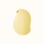 A compact, ergonomic lemon yellow clitoral suction device designed for pleasure, with a smooth surface and ipx7 waterproof, have fun in the tub or shower