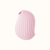 A compact, pink, ergonomic clit stimulator device designed for pleasure, with a smooth surface and body-safe silicone