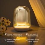 osuga cuddly bird clitoral suction toy with glowing night light on a surface