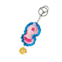 Crocheted vulva keychain with a pink and blue design