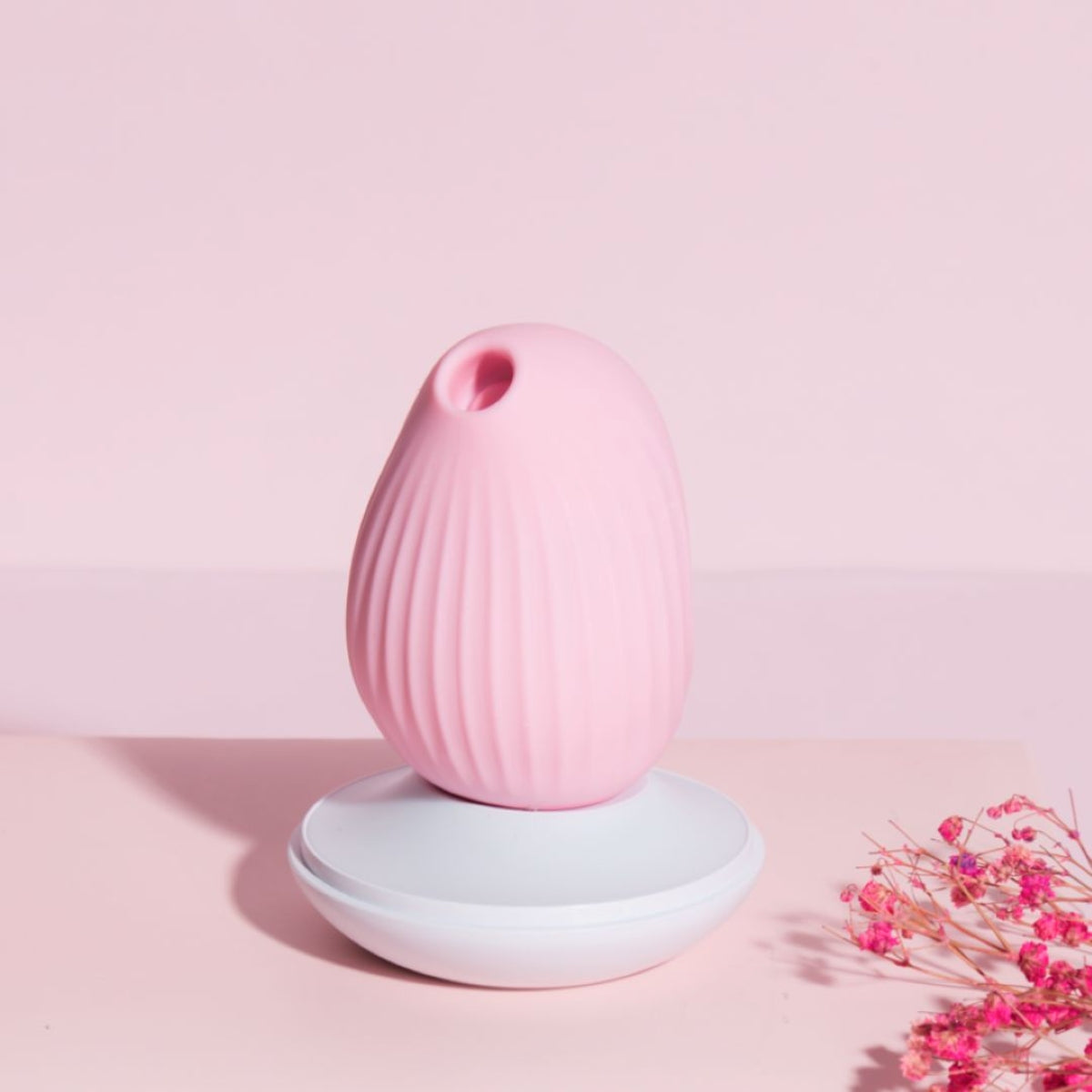 osuga cuddly bird clitoral sucking vibrator pink device with magnetic charging base