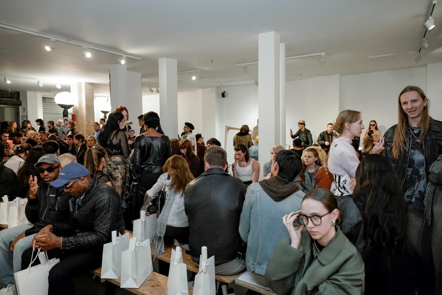 People attending the OSUGA X RUIbuilt Paris fashion show
